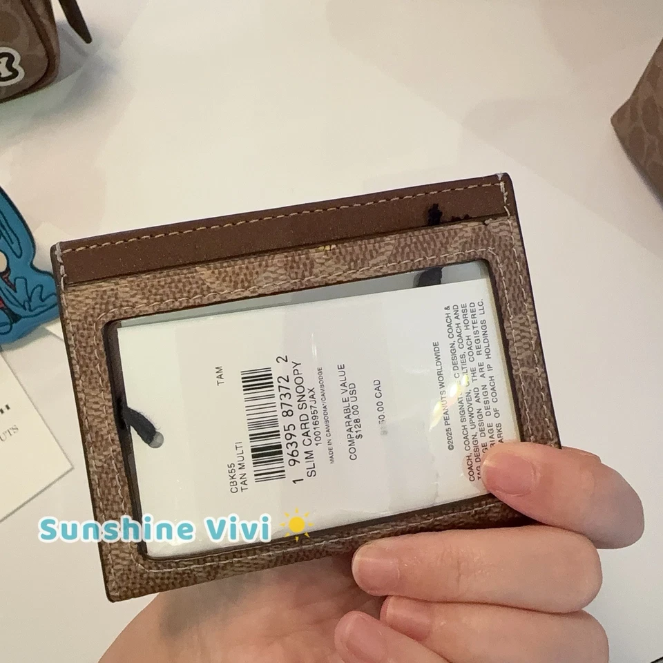 Nuevo con etiquetas Estuche delgado para tarjetas de identificación Coach X Peanuts lona exclusiva con estampado Snoopy CBK55 Foto 2 de 4