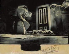 1971 Press Photo Attorney General Miller searches bags in Lawrence drug raid