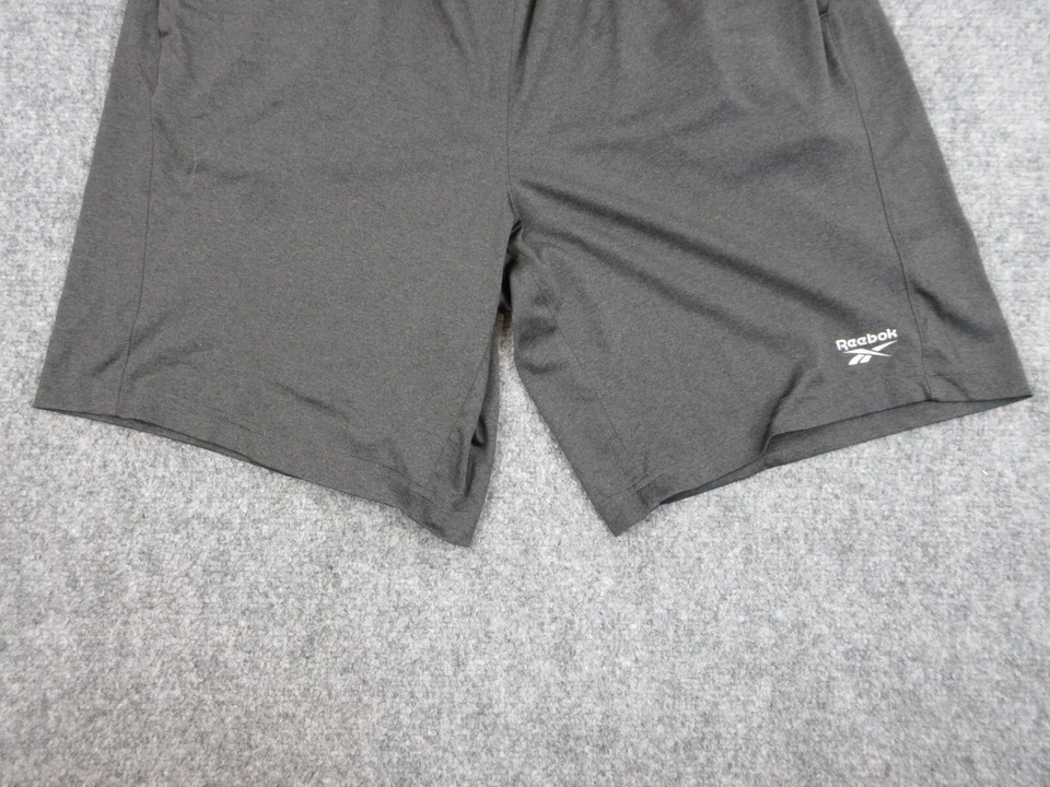 Pantalones Cortos Reebok Para Hombres Adultos Grandes Gris Informales Bolsillo Correr Atlético Gimnasio 30x19 Foto 2 de 4
