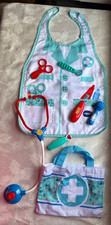 doctor outfit with doctor supply toy