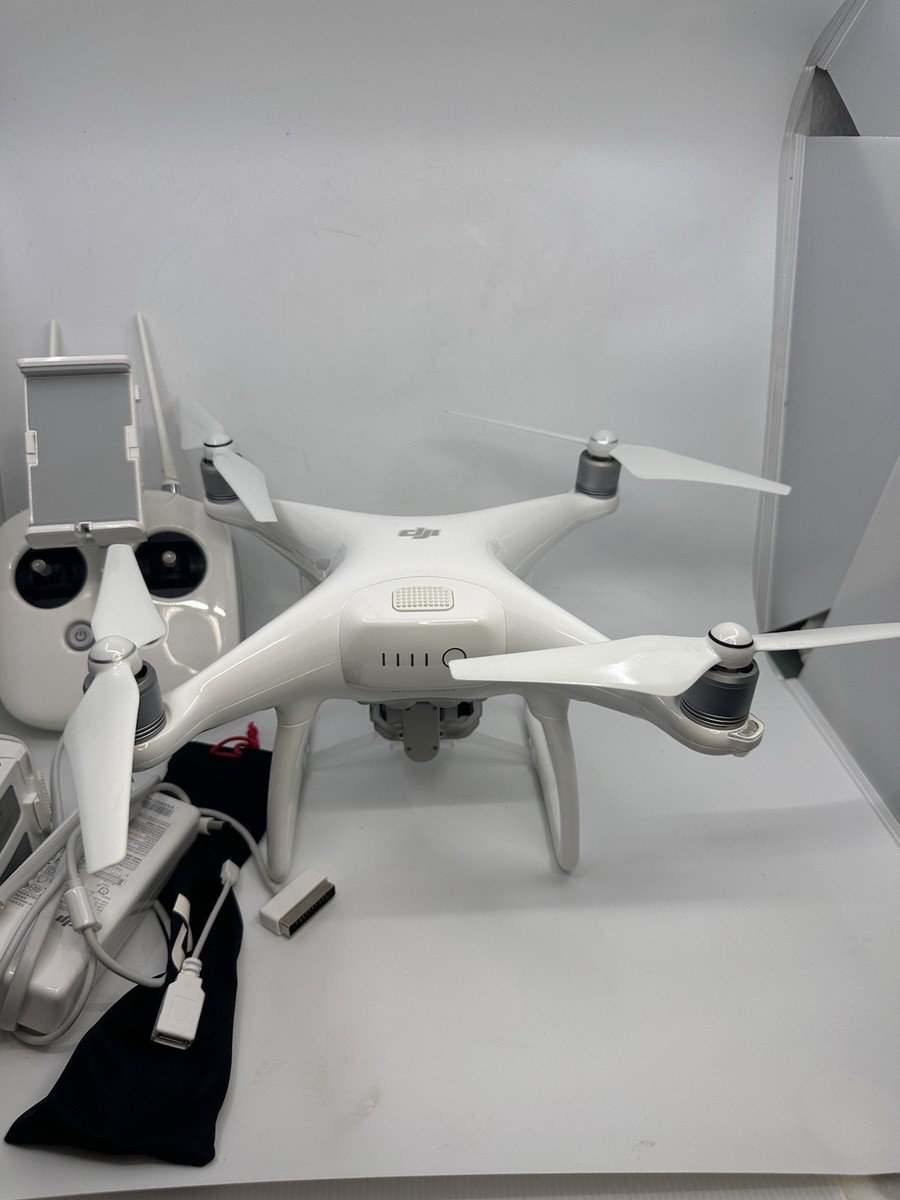 DJI Phantom 4 Drone with Manfrotto Backpack, 1- Battery