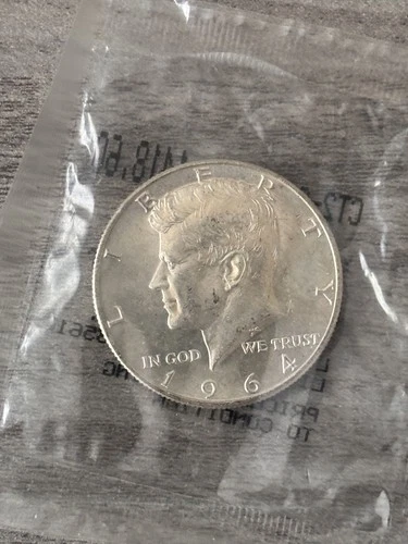 1964 Kennedy Half Dollar 90% Silver Original Littleton package Uncirculated BU