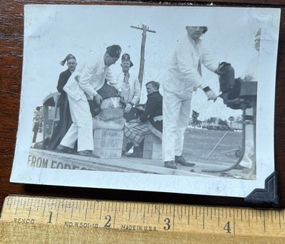Shriners' on Float, One being Dressed, possible organ grinder