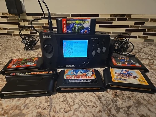 Sega Genesis Nomad MK6100 Tested & Working Powers On W/AC Adapter and 6 Games 