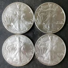 Two 2001 and Two 2004 $1 American Silver Eagle Dollars
