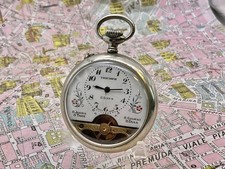 Triumph . 8 Day Charge. Metal . 1920 . POCKET WATCH