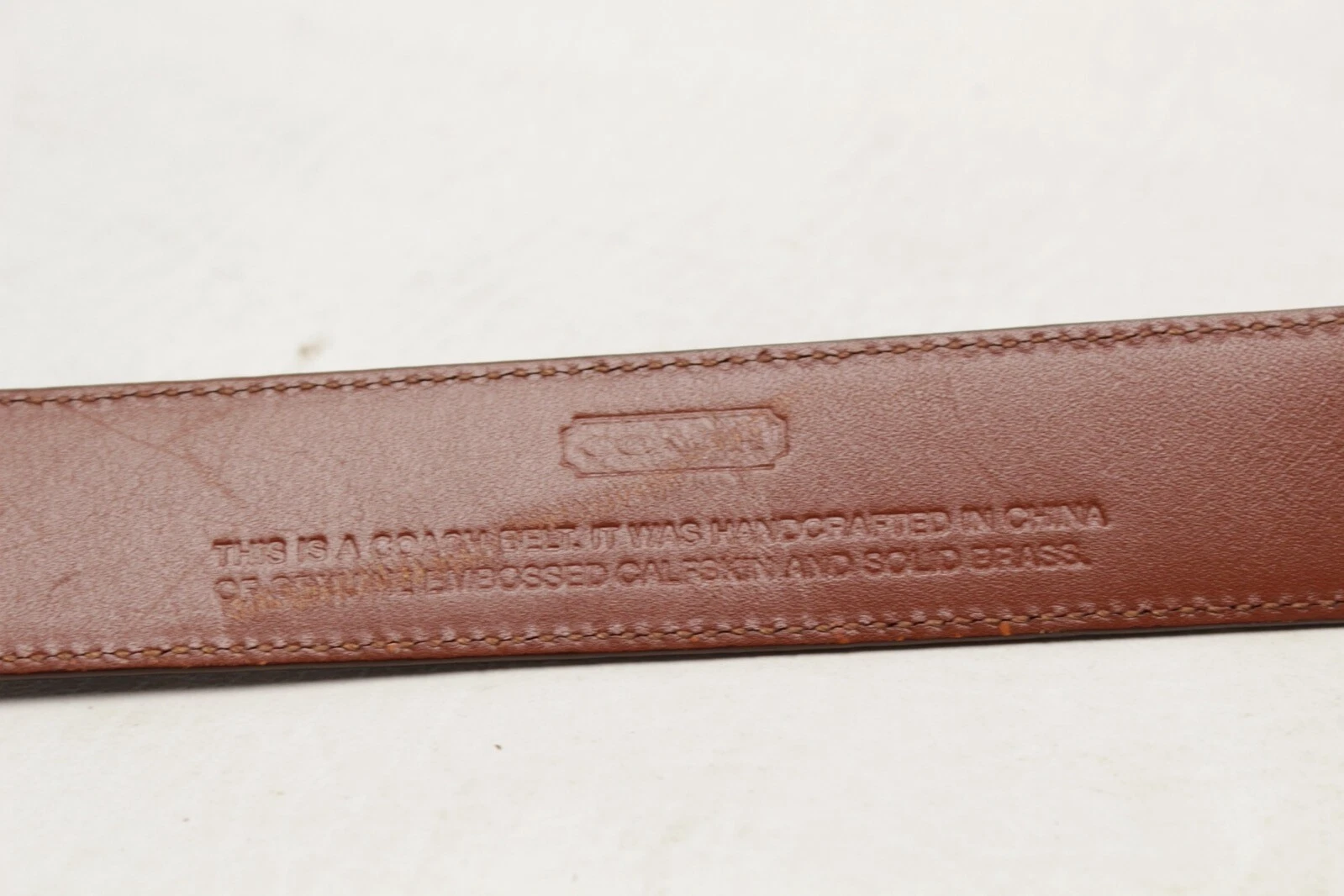 Coach 3758 Cintura elegante uomo 40 pelle di vitello testurizzata marrone fibbia cromata