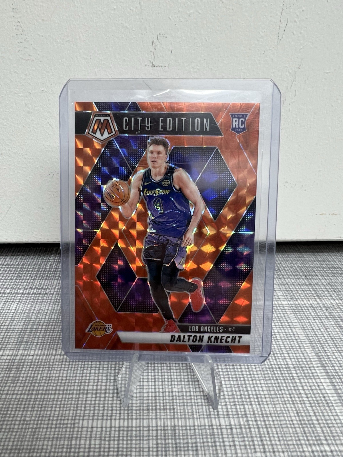 2024-25 Mosaic Basketball City Edition Dalton Knecht Orange Prizm /249