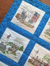 Handmade Quilted Wall Hanging or Table Topper in printed Vintage scenes