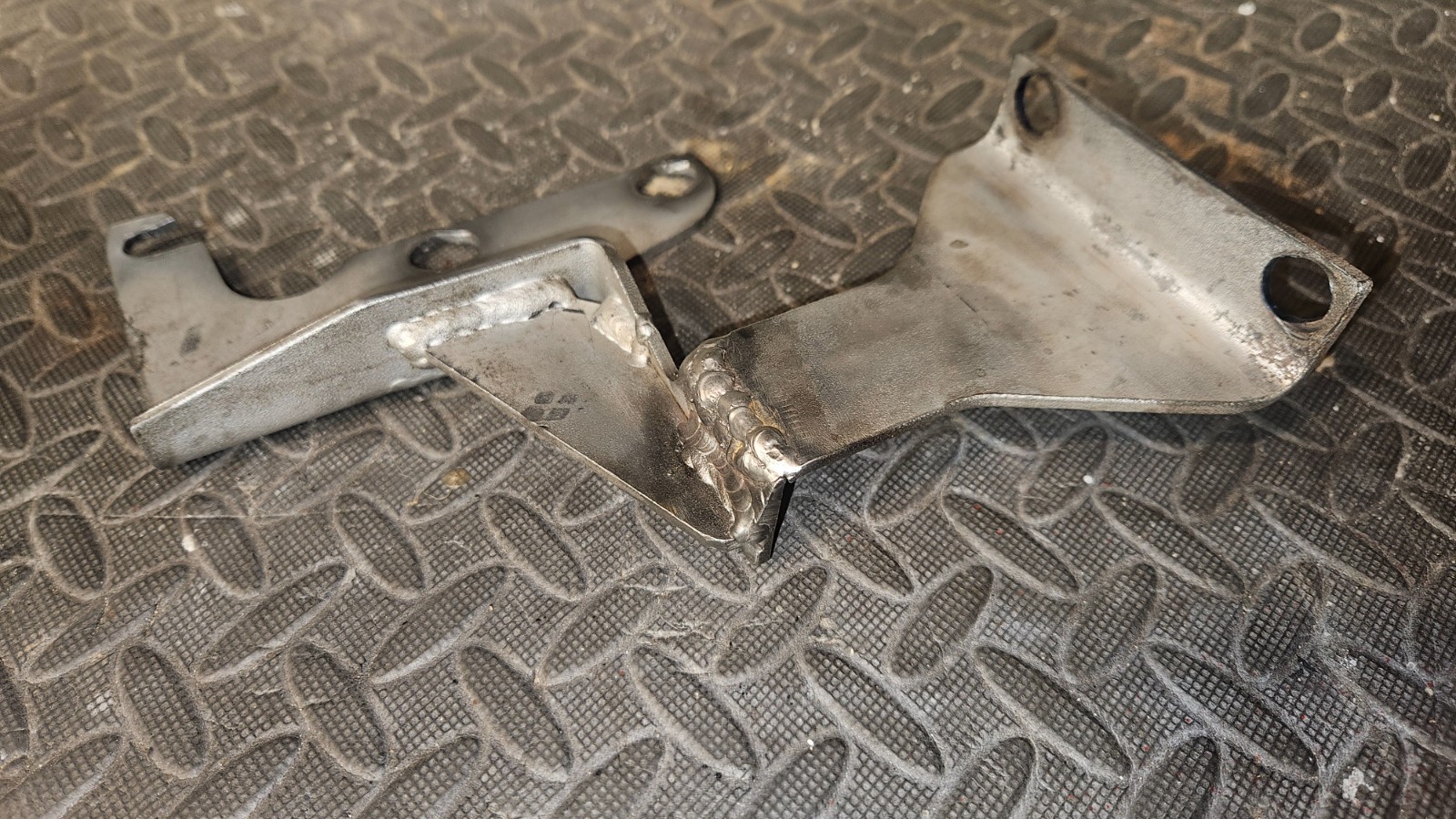 Ferrari 430, left & right exhaust gearbox mounting brackets, P/N 223144 & 223143
