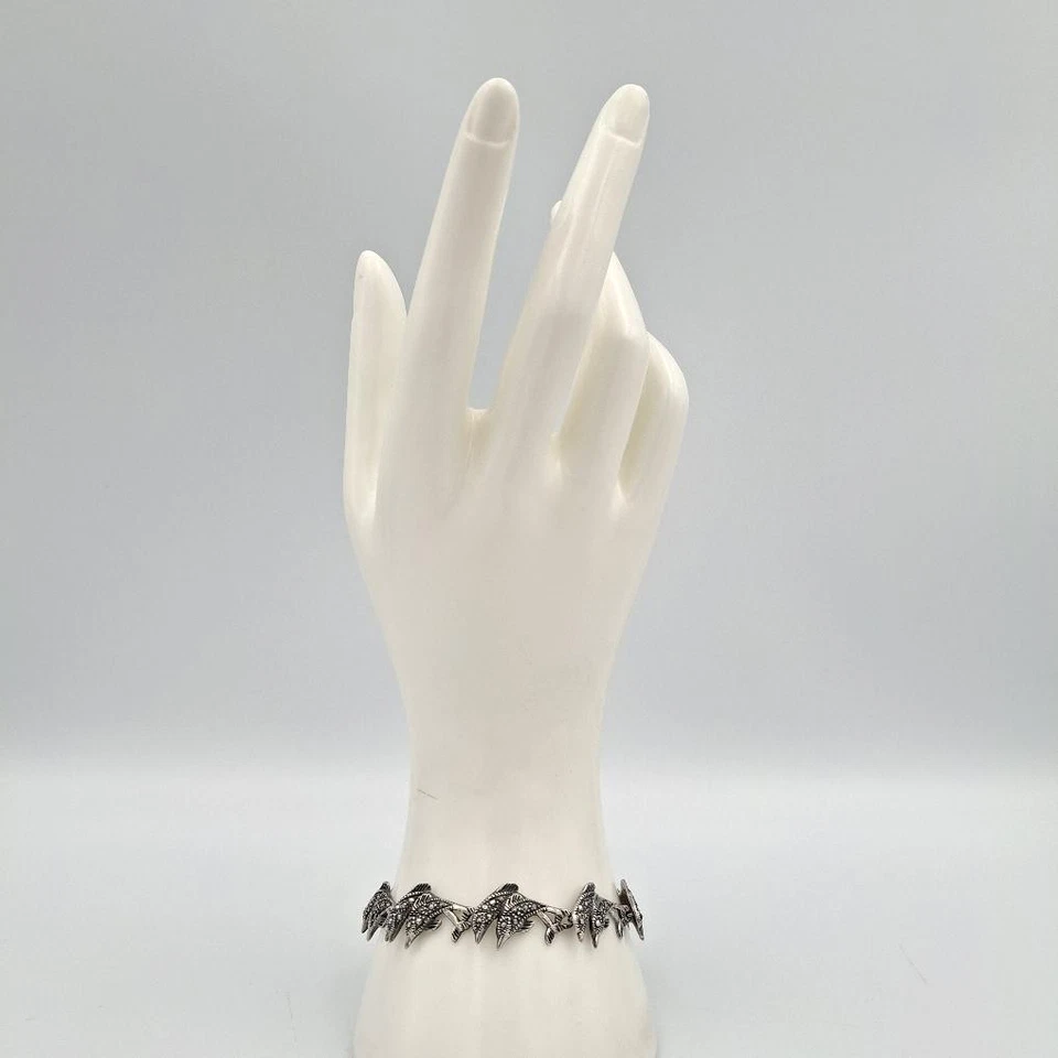 Brazalete de eslabones saltadores delfines incrustados de marcasita de plata de ley 925 de 7,25" Foto 3 de 4