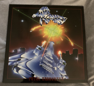 Air Raid - Fatal Encounter - Yellow Vinyl + Single Demons Eye
