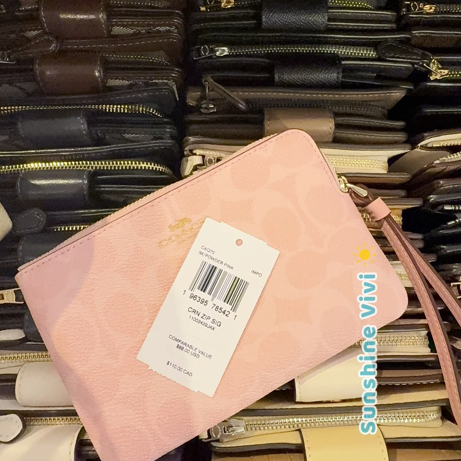 Bracciale Coach con zip angolare nuovo con etichette in tela firmato CAQ75 IM rosa cipria