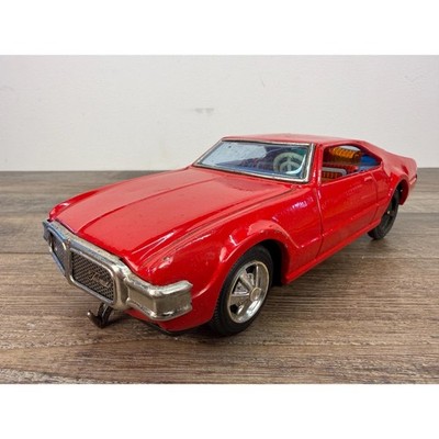 Vintage 1960s Taiyo Japan Bump N Go Oldsmobile Toronado Tin Car