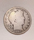 1907-D Silver Barber Half Dollar in good condition. A Semi-Key Date.