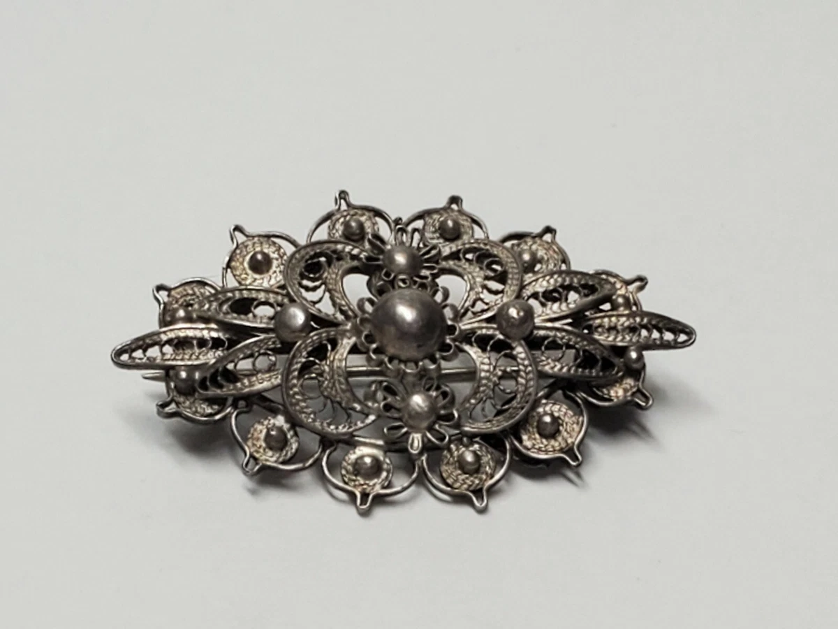 Antique silver brooch deals