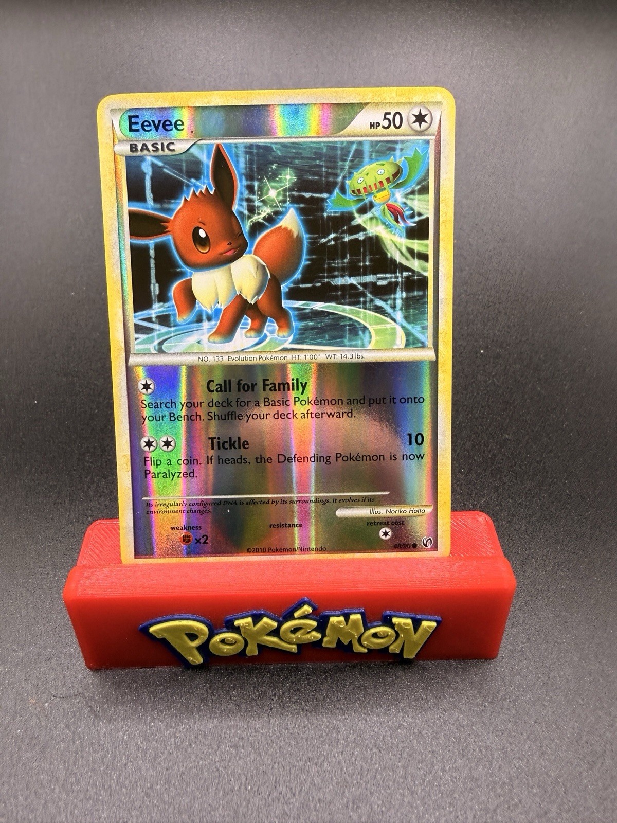 Eevee 48/90 Reverse Holo HGSS Undaunted Pokemon Card - NM Common