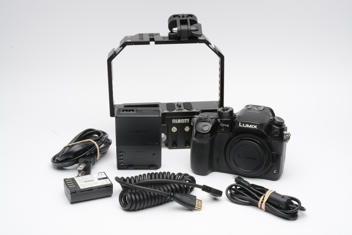 Panasonic Lumix DMC-GH4 Body, Cage, batt, charger, Only 2008 Acts