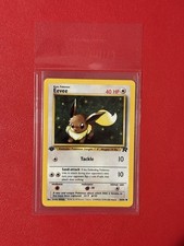 Eevee 55/82 Team Rocket Regular - 1st Edition