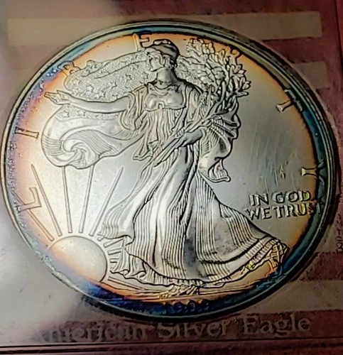 American Silver Eagle 1999 Uncirculated 1oz .999 $1 Monster Rainbow Toning. 5247