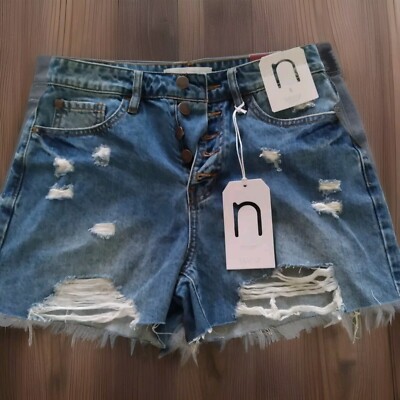 NATURE DENIM size small high rise med wash distressed cutoff jean