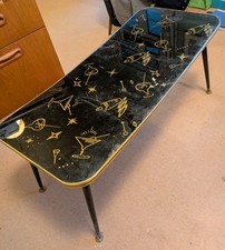 Glass Topped Coffee Table 1950s. Gold & black Atomic/Dansette Legs. NEEDS REPAIR