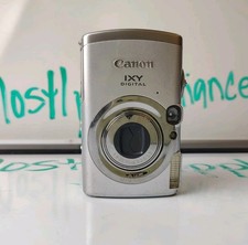 Canon IXY DIGITAL 810 IS Compact Digital Camera 8.0MP w/Battery Charger