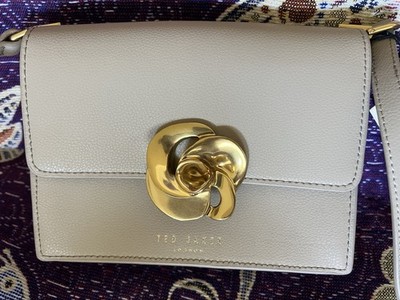 Ted Baker Beige Shoulder Bag Gold Flower Accent Adjustable Strap Inner Pockets