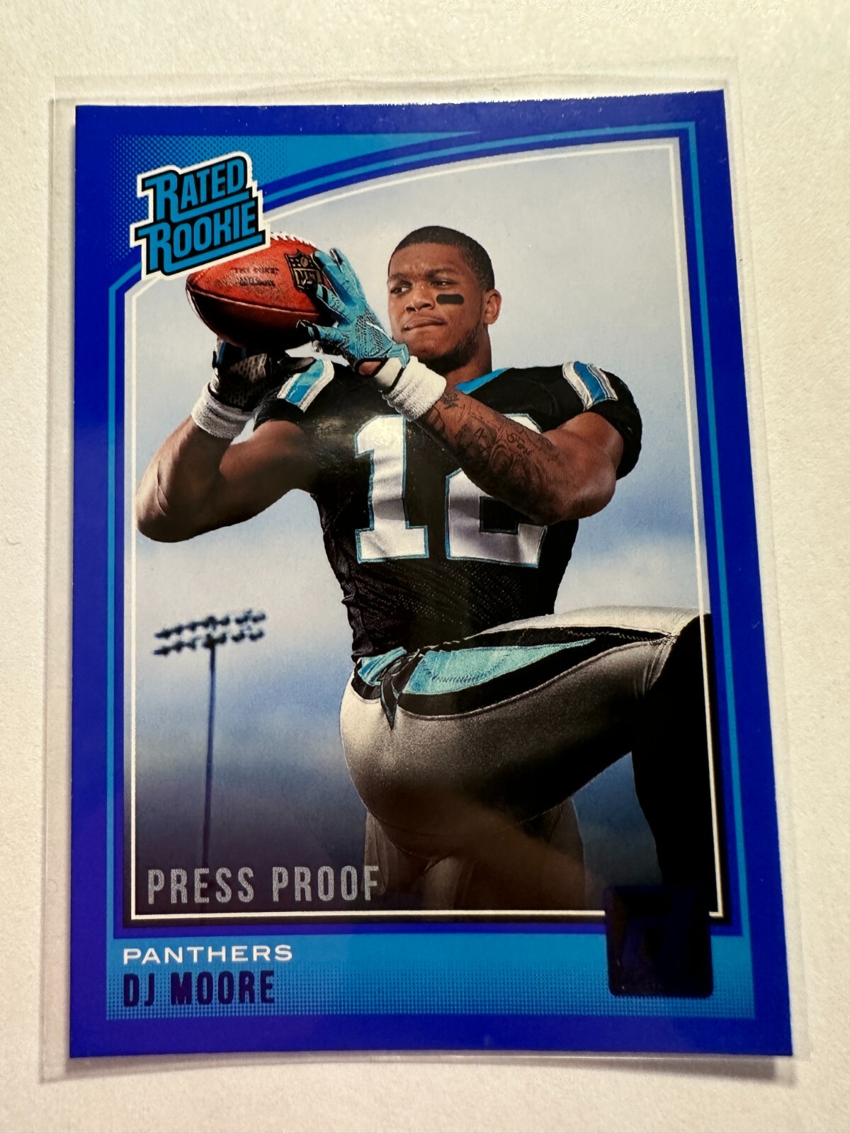 K20,522 - 2018 Donruss Press Proof Blue #316 D.J. Moore RR