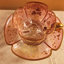MOSER TYPE  GOLD ENAMEL DECORATED PINK/CRANBERRY DEMITASSE CUP/SAUCER