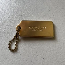 Coach Gold Tone Metal Hang Tag Bag Charm 2.25x1