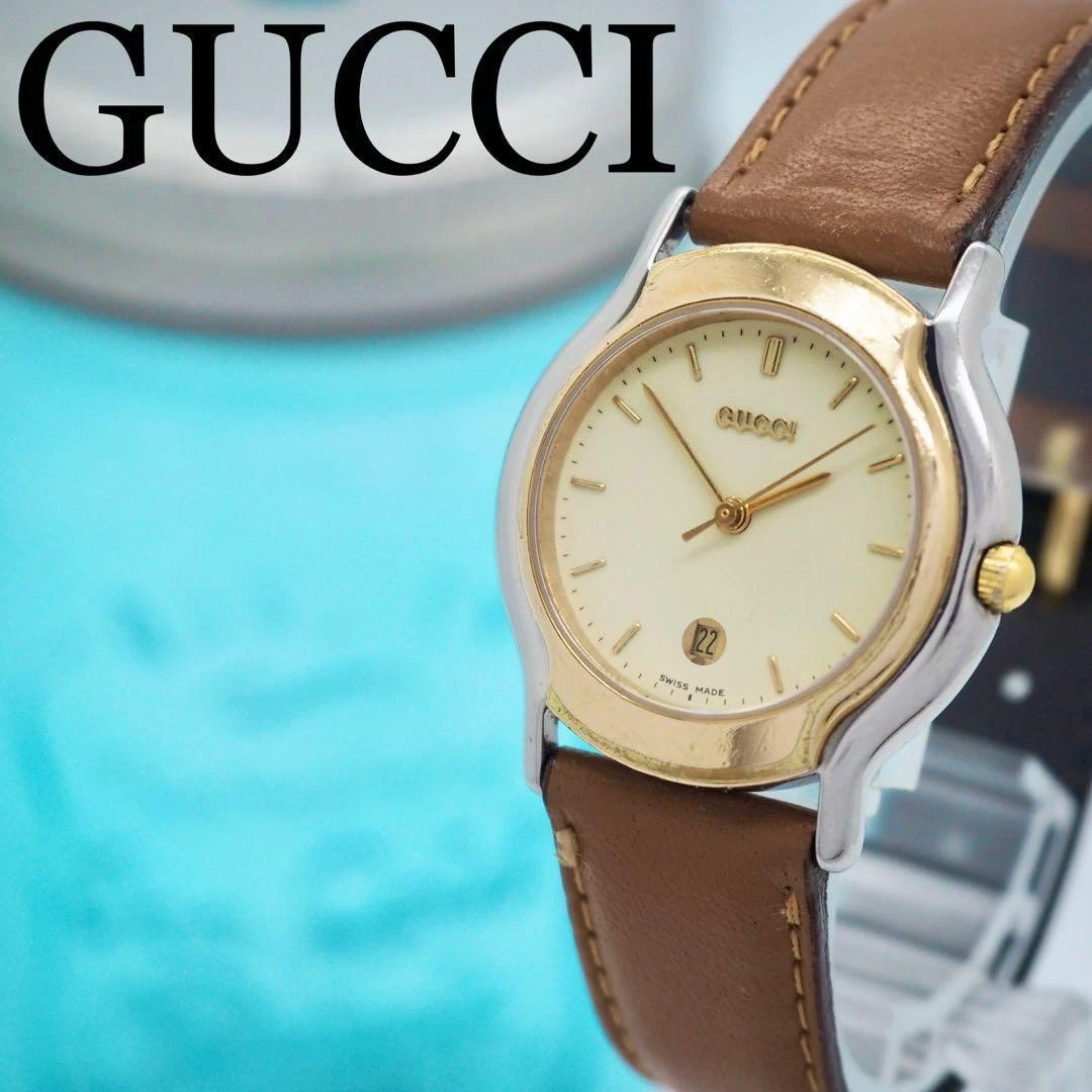 Montre femme 276 Gucci or 8000L date vintage