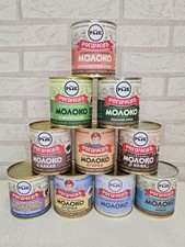 10 cans of condensed milk with different flav...