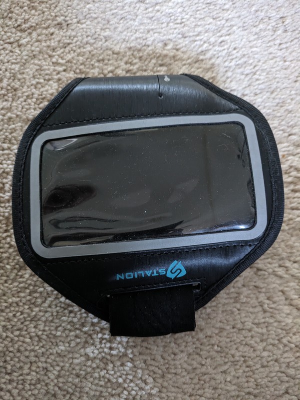 Armband storage for sports. can hold phone, cards, keys, etc.