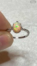  122B- 1.05ct Genuine Ethiopian Welo Opal set in a Size 8 Sterling Silver Ring