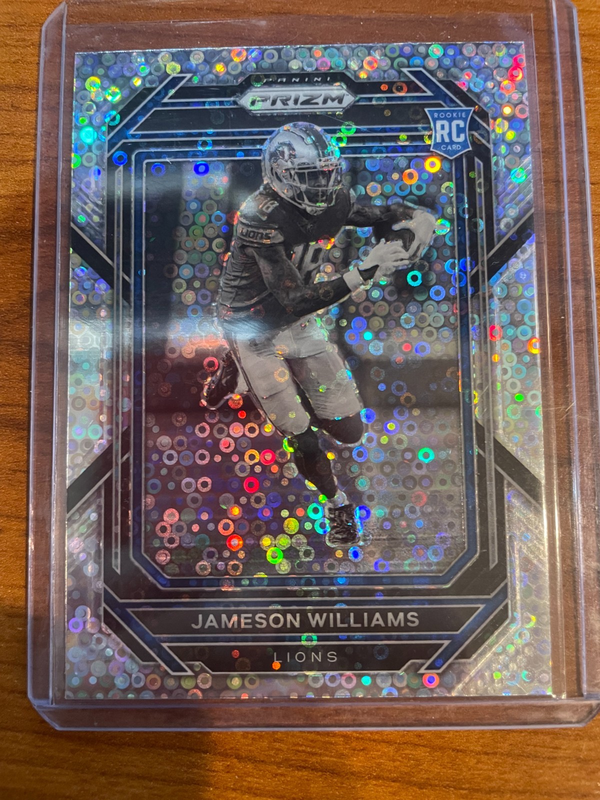 2022 Panini Prizm Jameson Williams Variation No Huddle Silver Disco #311 B & W