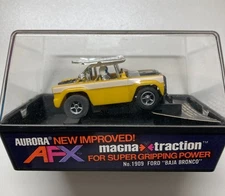 AURORA AFX #1909 FORD "BAJA BRONCO" YELLOW HO Slot Car BANDED IN ORIGINAL CUBE
