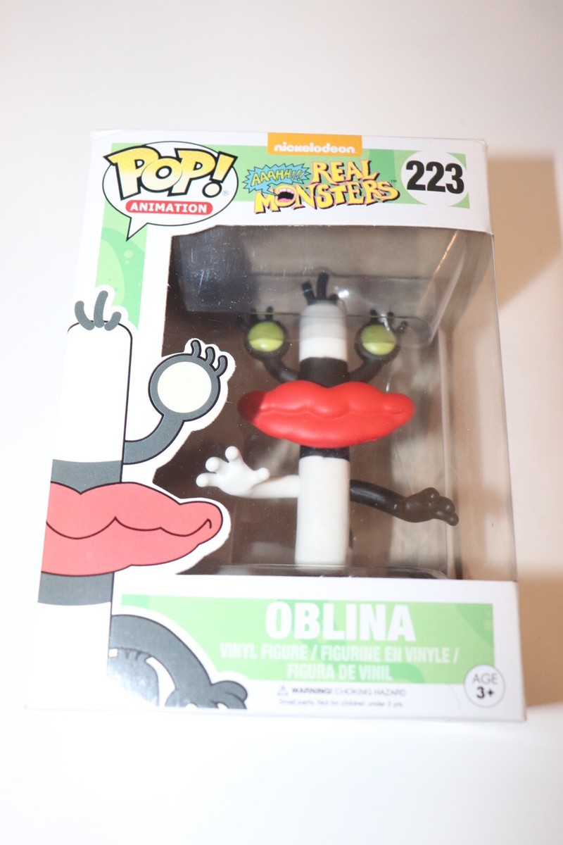 Help me find This Vintage NICKELODEON 1997 AAAHH!!! REAL  Nickelodeon Real Monsters Oblina Vinyl Figure - Black, White, Red main image 1