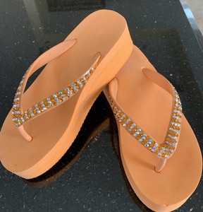 orange platform flip flops