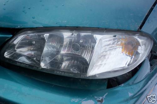 1997 Pontiac Grand Am DRIVER'S side Headlight - Picture 1 of 1