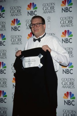Drew Carey does some self promotion backstage at Golden Globe Awa- 1997 Photo 1