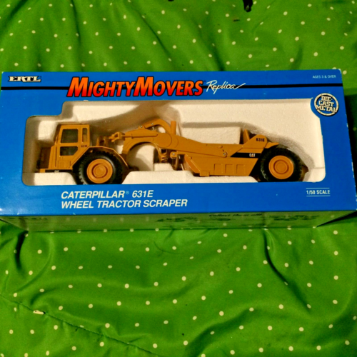 Ertl Mighty Movers Caterpillar wheel tractor scrapper 631E New in box 1/50 scale