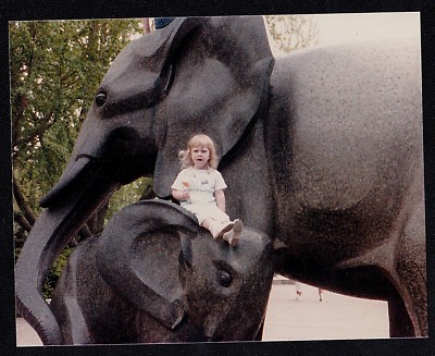 Vintage Photograph Sitting Way Up High on Elephant Statue