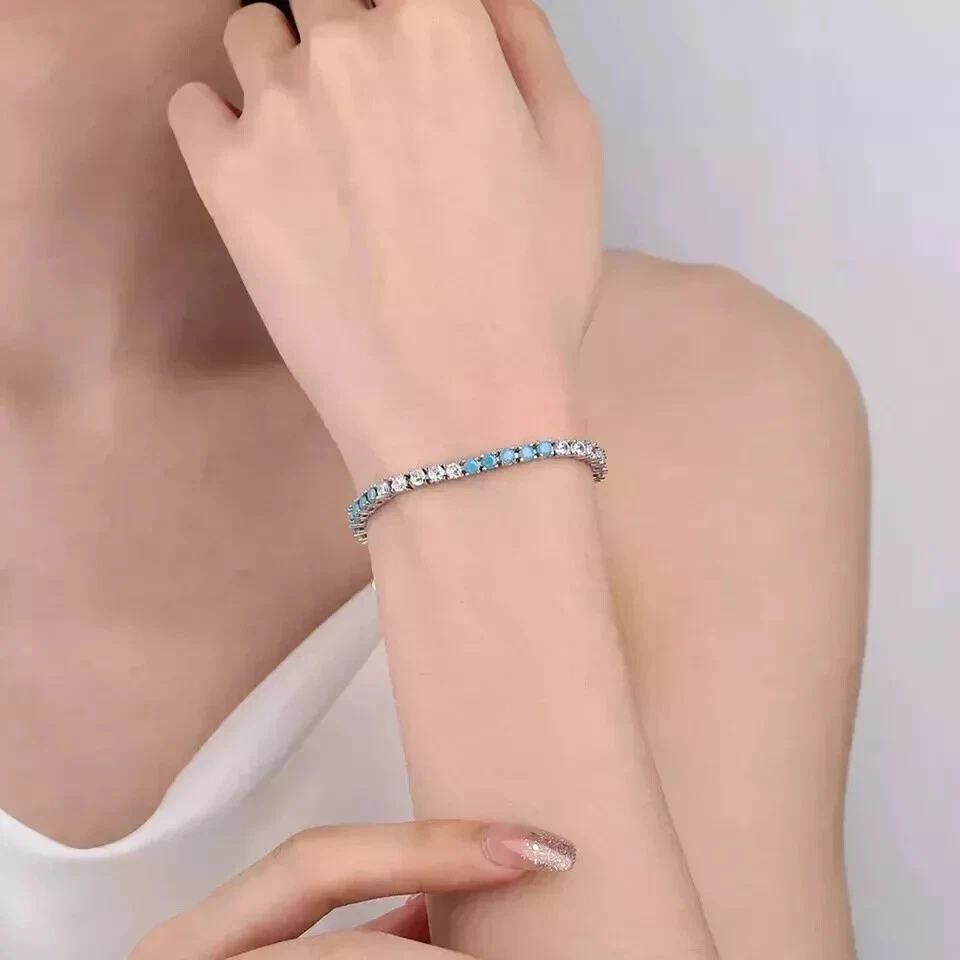 Brazalete de tenis turquesa/diamante creado en laboratorio de corte redondo de 4 mm de oro blanco de 14 K Foto 4 de 4