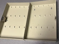 Wall mounted key cabinet, 28 key capacity, resettable combination lock, used