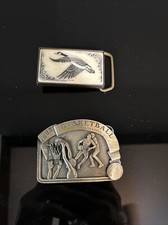 Couple Older belt buckles vintage. Duck Basketball