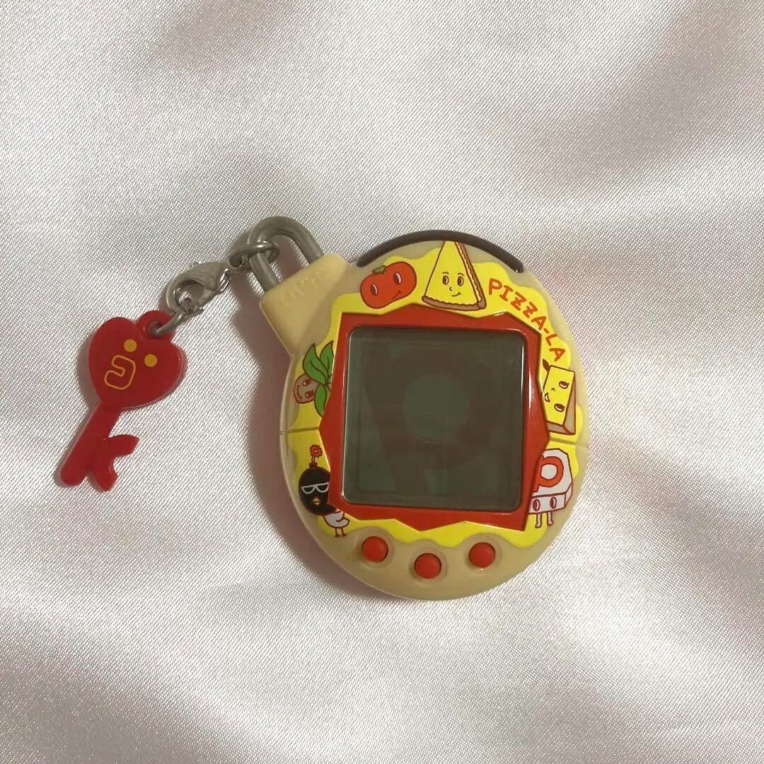 Tamagotchi pizzala yeah Family Iloilo BANDAI Pet Game Toy | eBay