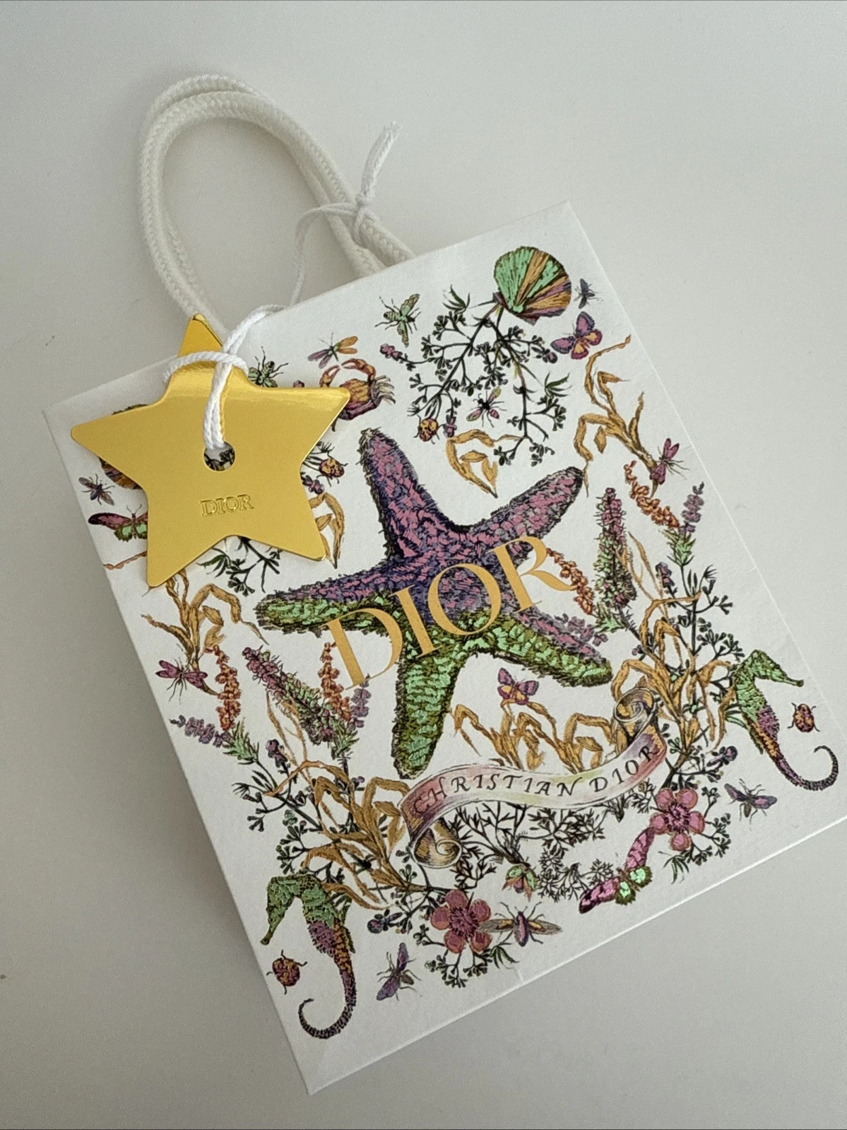 Sac shopping en papier Dior STARFISH SEA LIFE breloque étoile dorée