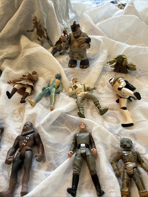 36 Star Wars Vintage Figures plus weapons plus Bonus 2 slides. 