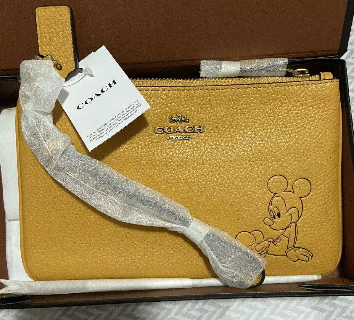 Mickey mouse coach wristlet sale